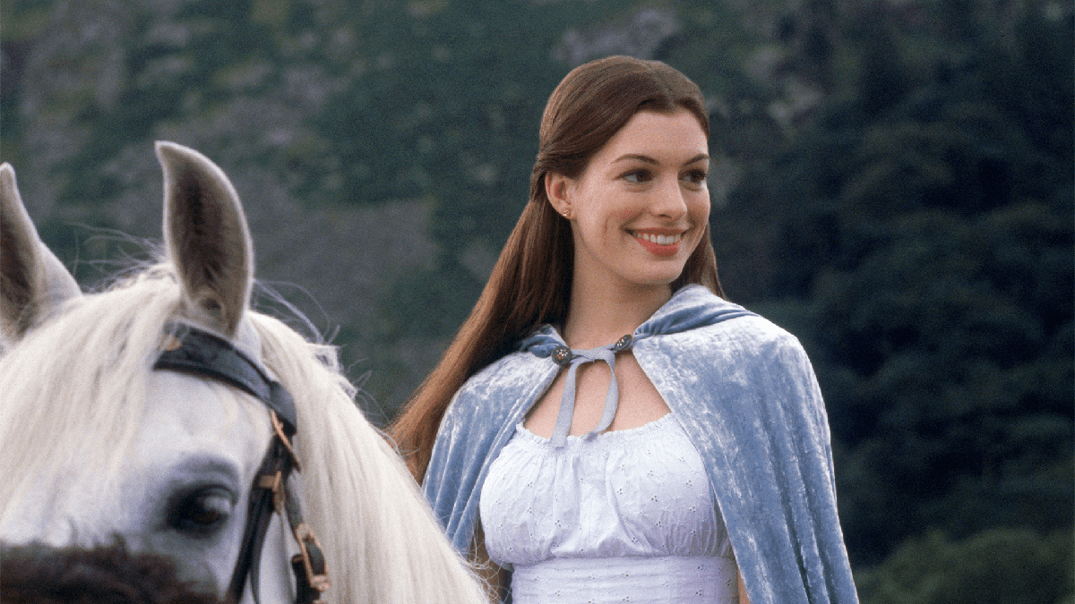 Cena do filme Uma Garota Encantada com Ella e o Príncipe Char em momento romântico