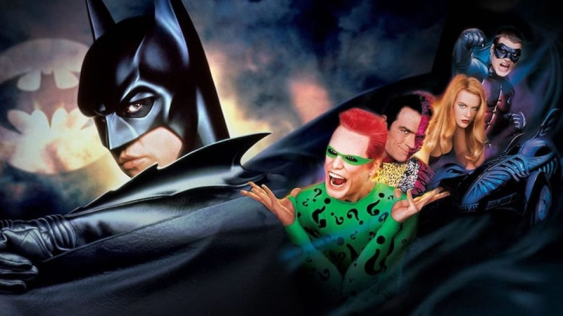 Pôster oficial de Batman Eternamente com Batman, Robin, Charada e Duas-Caras em composição colorida