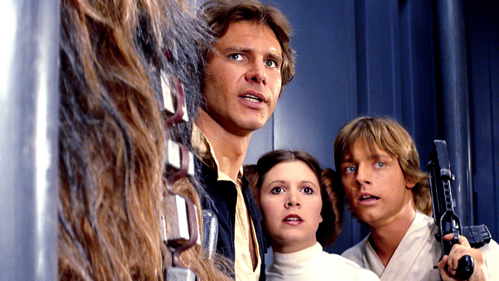 Han Solo, Leia Organa e Luke Skywalker se escondem atrás de Chewbacca em Star Wars A New Hope