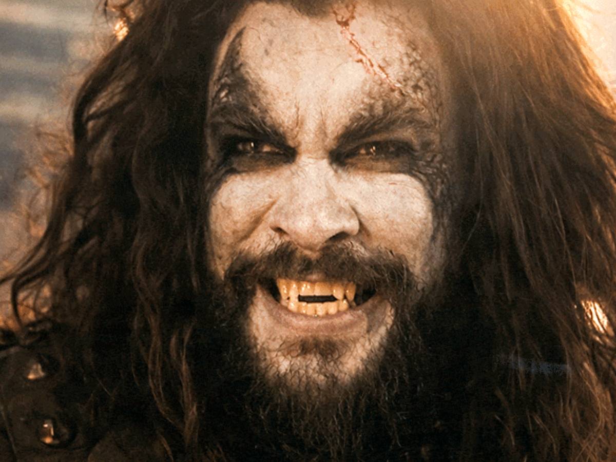 Jason Momoa caracterizado como Lobo em imagem promocional sombria, visual de anti-herói espacial