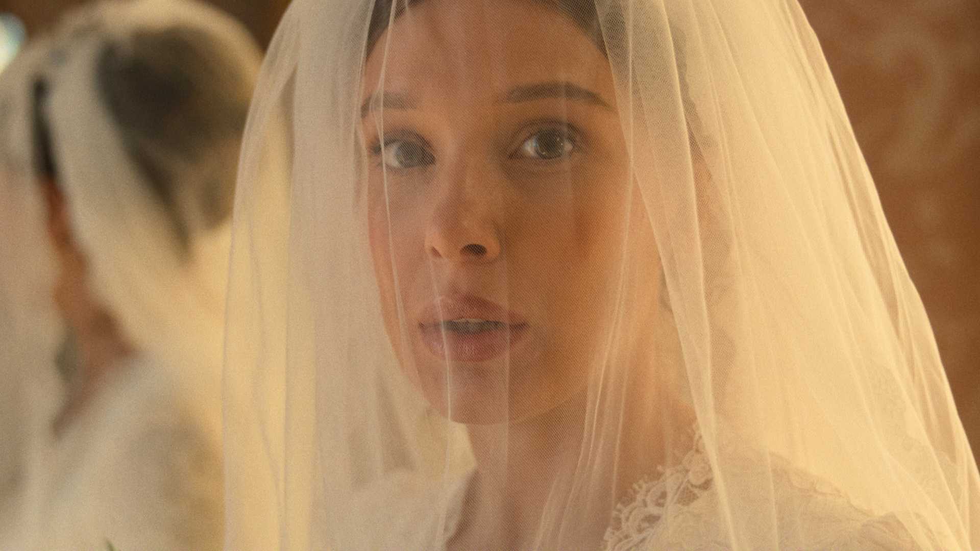 Millie Bobby Brown in a wedding dress in Enola Holmes 3