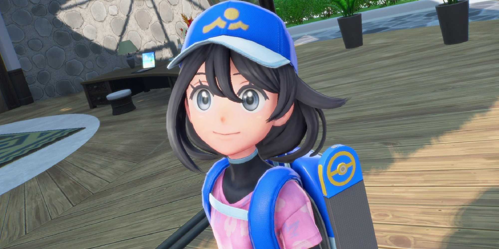protagonista de pokemon winds and waves sorrindo para cima