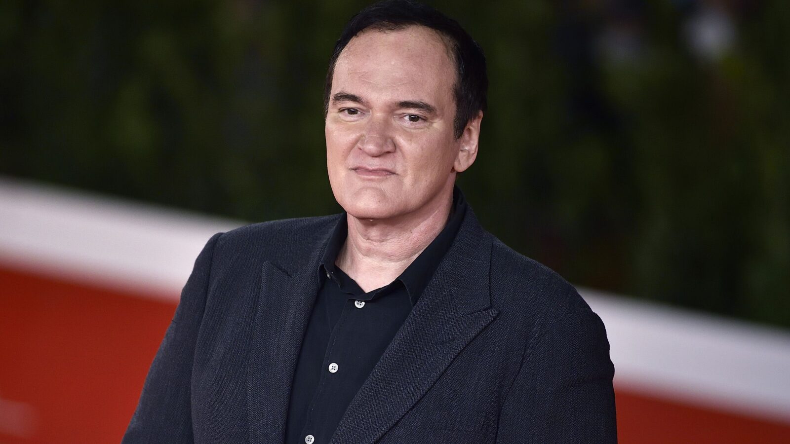 Tarantino em Tangled Up in Blue com Jason Isaacs e Kylie Minogue