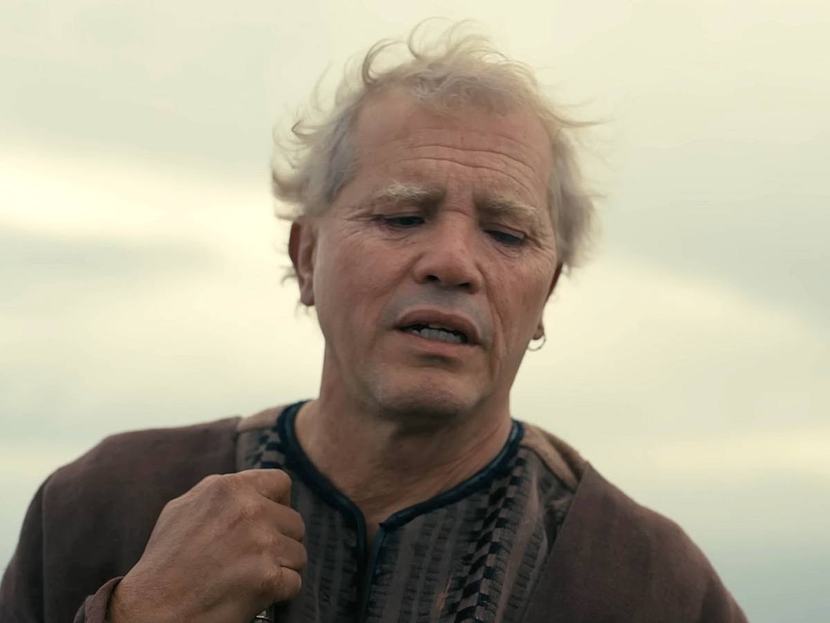 Pôster oficial de A Odisseia destacando Christopher Nolan e o elenco principal com acabamento épico